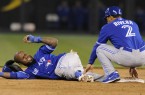 Toronto Blue Jays' Reyes reacts to the pain after hurting his ankle in the sixth inning against the Kansas City Royals at baseball game in Kansas City