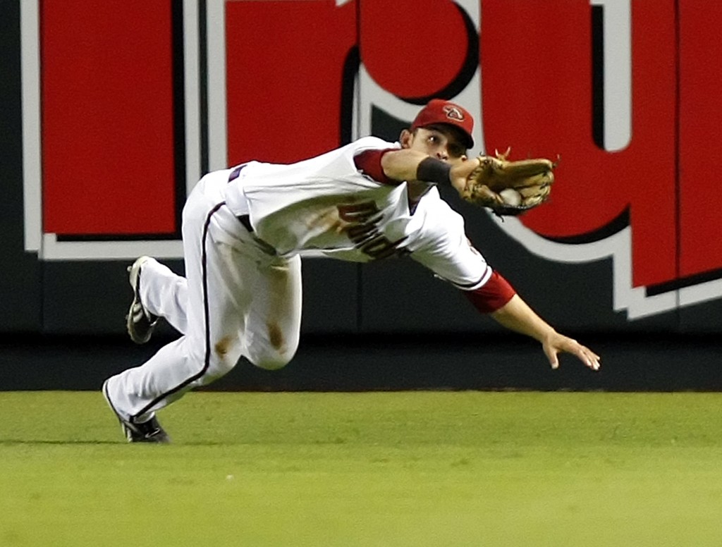 Arizona Diamondbacks center fielder Parra makes the diving catch against the New York Mets during their National League MLB baseball game in Phoenix